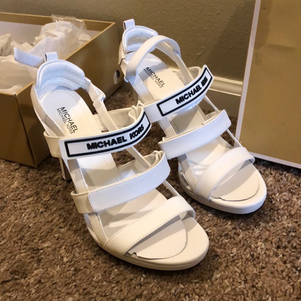 Never worn Michael Kors White strappy heels